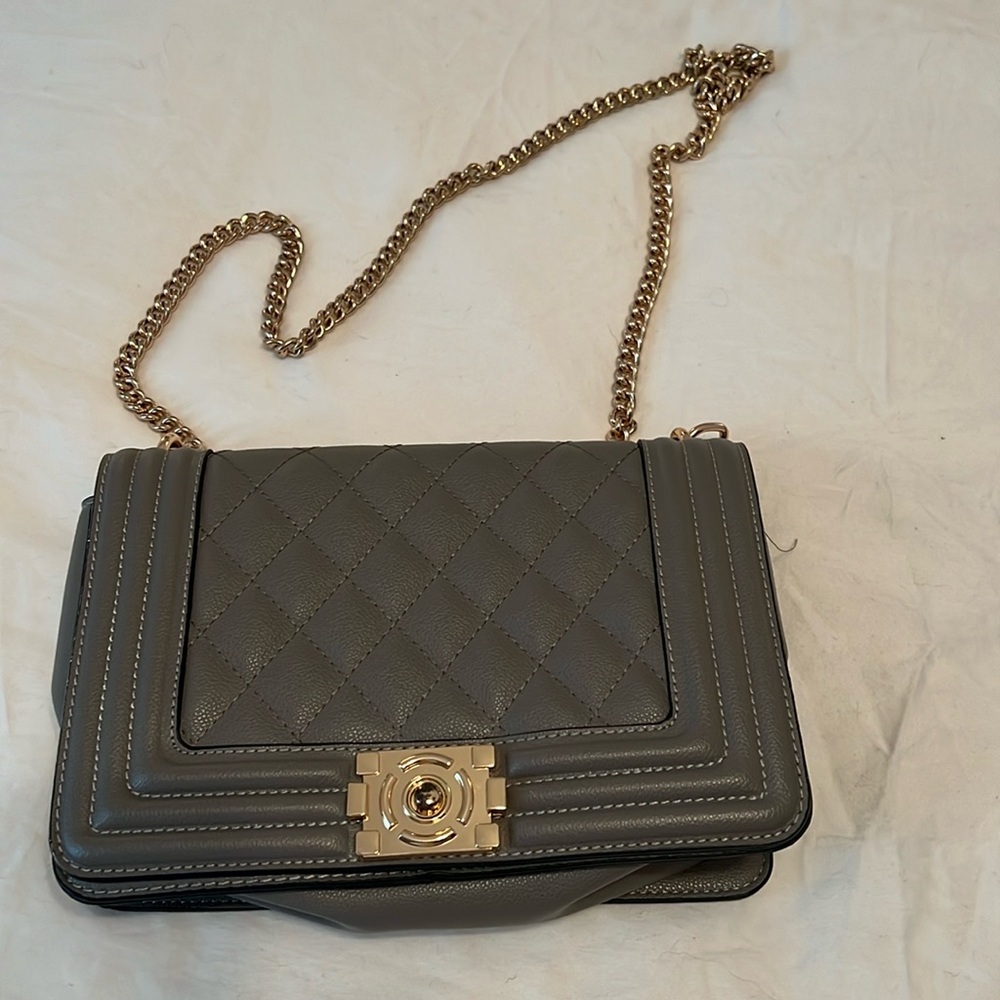 Fashion Grey quilted bag with gold hardware. No brand. NWOT.